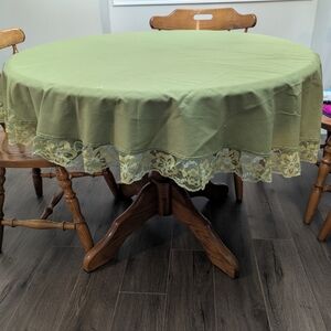 Elegant Green Circle Tablecloth with Lace Trim. 64 Inches In Diameter  .